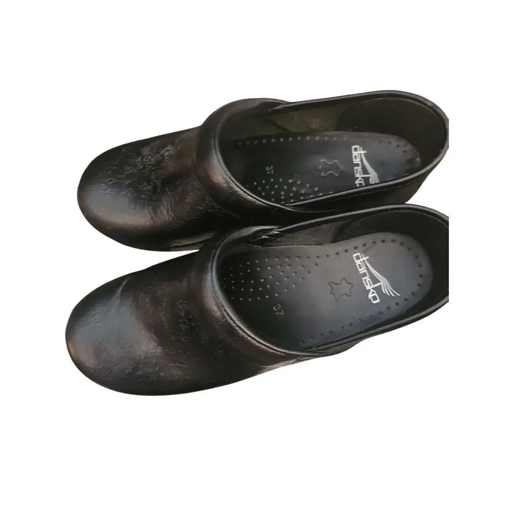 Dansko women's black floral tooled clogs, size 37 (US 7) SH156